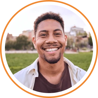 A smiling patient portrait represents positive experiences and trusted chiropractic care at Perfectly Tuned Chiropractic.