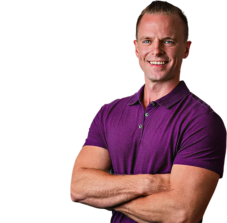 Dr. James Shannon smiles in a professional portrait as the lead chiropractor at Perfectly Tuned Chiropractic.